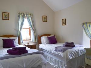 Postel nebo postele na pokoji v ubytování Brampton Hill Farm Cottage