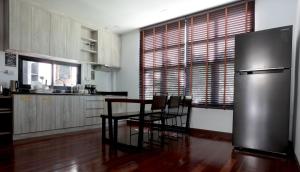 Kuchyň nebo kuchyňský kout v ubytování TarTar & Nay Hostel