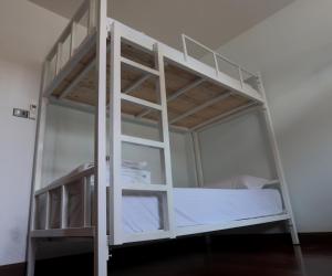 Postel nebo postele na pokoji v ubytování TarTar & Nay Hostel