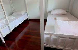Postel nebo postele na pokoji v ubytování TarTar & Nay Hostel