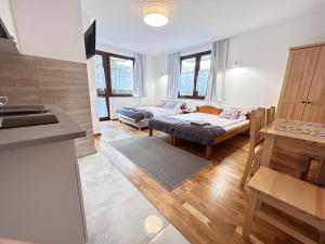 Willa Dunajcówka客房内的一张或多张床位