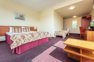 Postel nebo postele na pokoji v ubytování Meduza Hotel + 56 fotografií