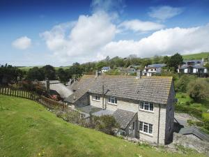 an aerial view of a house in a village at The Retreat Lulworth in West Lulworth
