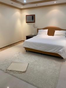 Ein Bett oder Betten in einem Zimmer der Unterkunft شقه مفروشه للايجار اليومي