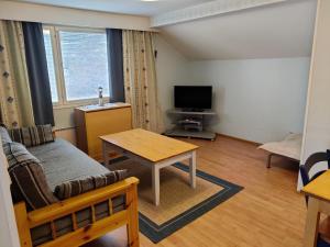 Μια τηλεόραση ή/και κέντρο ψυχαγωγίας στο Marent Apartments