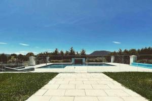 a swimming pool in the middle of a yard at The York Residence in Hartley NSW - Newly Listed in Hartley