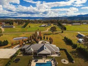 an aerial view of a large house with a yard at The York Residence in Hartley NSW - Newly Listed in Hartley