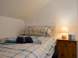 Posteľ alebo postele v izbe v ubytovaní Horseshoe Cottage