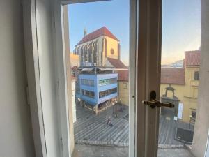 a view of a building from a window at Apartments 5 in the centre of Prague in Prague