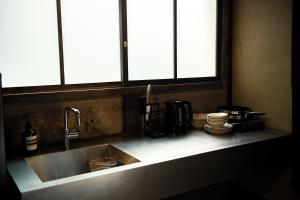 Cucina o angolo cottura di Oito 美しい街並みに佇む喫茶と宿