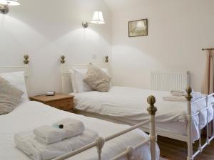 מיטה או מיטות בחדר ב-The Loft - 26477