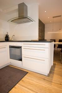 Kuchyň nebo kuchyňský kout v ubytování Residence Bellevue