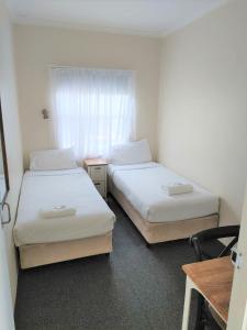 Postel nebo postele na pokoji v ubytování Bathurst Explorers Motel