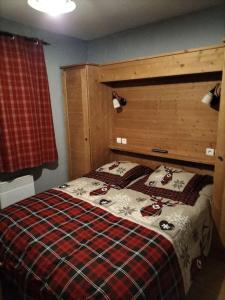 Ένα ή περισσότερα κρεβάτια σε δωμάτιο στο Le hameau des Rennes