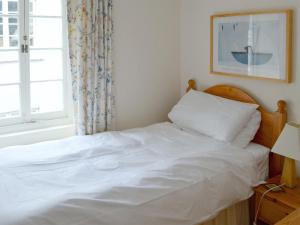 Posteľ alebo postele v izbe v ubytovaní Mill Cottage