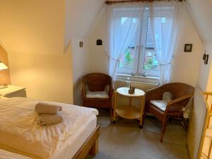 Postel nebo postele na pokoji v ubytování Große Freiheit Ferienhaus Dangast