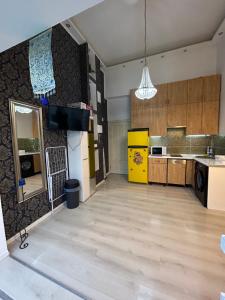 Kuchyňa alebo kuchynka v ubytovaní Roland Apartment Downtown - Akácfa