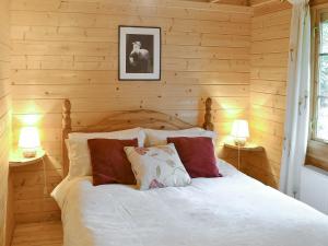 Posteľ alebo postele v izbe v ubytovaní Forest Lodge
