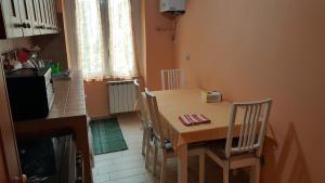 A kitchen or kitchenette at Appartamento Via Bixio