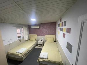 Giường trong phòng chung tại Ersoy Efe Pansiyon