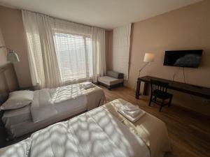 Cama o camas de una habitación en Hotel Truso