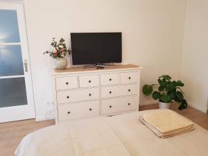 A television and/or entertainment centre at Kislakás Esztergomban