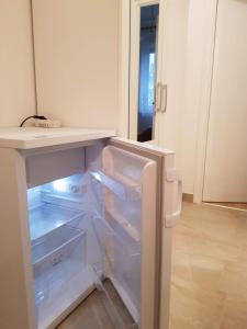 A kitchen or kitchenette at Kislakás Esztergomban