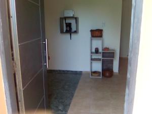 a hallway with a glass door in a room at Posada del Viajero San Rafael in San Rafael