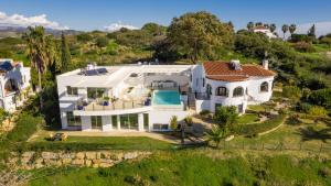 an aerial view of a large white house at Villa Hesla in Estepona