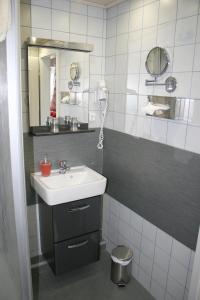Koupelna v ubytování Gästehaus Gudrun + 35 fotografií