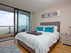 Кровать или кровати в номере Pebbles, Horizon View