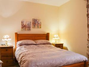 Cama o camas de una habitación en Pear Tree Cottage