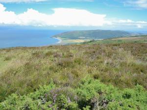 a view of the ocean from the top of a hill at Old Rectory Cottage in Oake