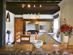 Kjøkken eller kjøkkenkrok på Mews Cottage