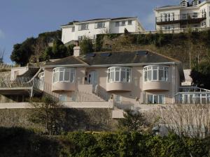 a house on the side of a hill at Rock House in Torquay