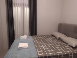 Postel nebo postele na pokoji v ubytování Villa Sky Garden