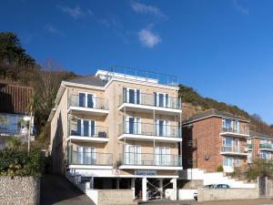 an apartment building with a balcony on the side of it at Culver View in Shanklin