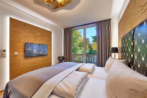 Ένα ή περισσότερα κρεβάτια σε δωμάτιο στο Parkchalet