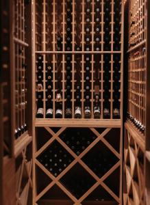 a wine cellar filled with bottles of wine at Rainbow Ranch Lodge in Big Sky Canyon Village