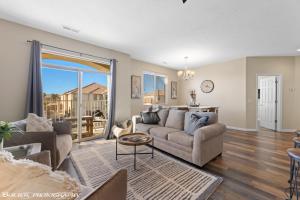 a living room with a couch and a table at Sparkling Springs by J & Amy BL90802 in Mesquite