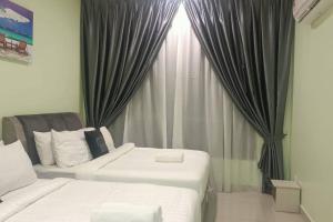 Katil atau katil-katil dalam bilik di Bali Residence by Beca inn , musliim only +7 gambar