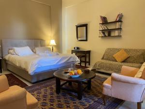 Ένα ή περισσότερα κρεβάτια σε δωμάτιο στο Papastavrou Apartments