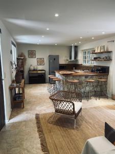 a kitchen with a table and chairs in a room at Casa Legna in Pigna