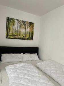 Cama o camas de una habitación en Hahnenklee Ferienpark Haus 2
