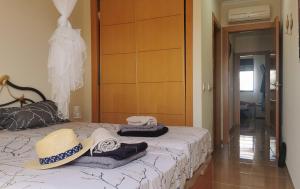 Łóżko lub łóżka w pokoju w obiekcie Sol y Alma Mediterranean Apartment
