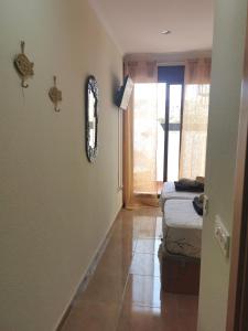 Łóżko lub łóżka w pokoju w obiekcie Sol y Alma Mediterranean Apartment