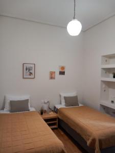 Postel nebo postele na pokoji v ubytování Ergina Green Park