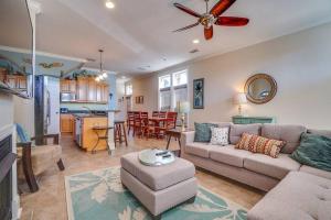a living room with a couch and a table at Amzg Gulf view,4 Bd/3.5 Bath Home, Pvt heated Pool in Panama City Beach