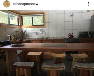 Kuchyň nebo kuchyňský kout v ubytování Cabaña Angka Wenu