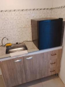 Una cocina o zona de cocina en N7 7 Habitación con Baño Privado y Kitchenette
